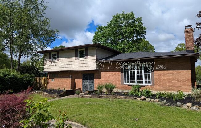 Spacious Split-Level Home in Columbia Station with 4+ Car Garage!
