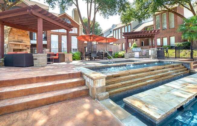 Lakewood on the Trail outdoor entertainment area with pool access Apartments in Dallas, TX