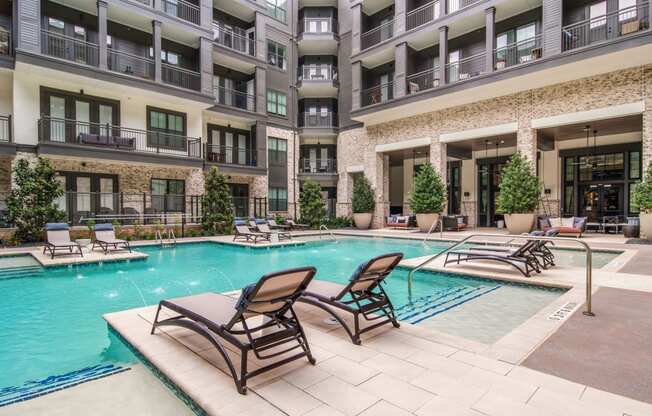 Poolside Seating at The Alastair at Aria Village Apartment Homes in Sandy Springs, Georgia, GA