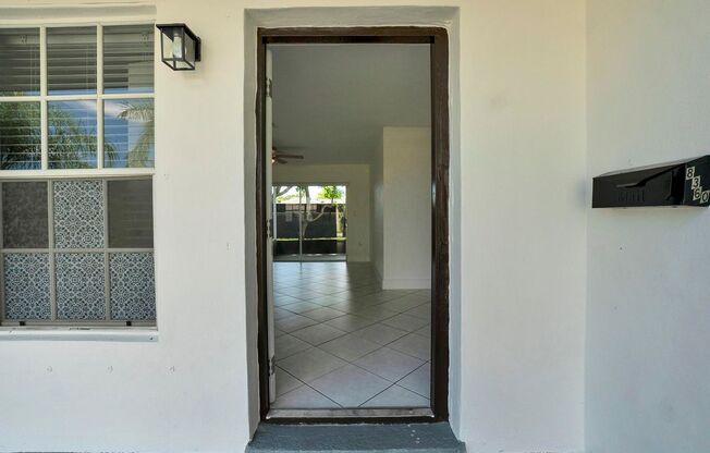 Sunrise Gem: Updated 2-Bed, 2-Bath with Garage Parking