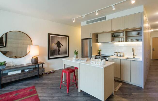 a kitchen and living room with a white counter at Reed Row, Washington, DC