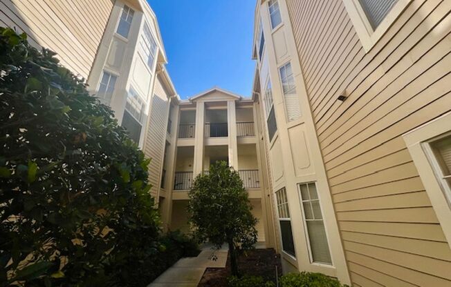 MOVE IN NOW! WATER INCLUDED! BEAUTIFUL 2BED/2BATH CONDO WITH SCREENED IN BALCONY!