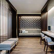 Common room with desk at The Graham at Southern Towers, Alexandria, VA, 22311