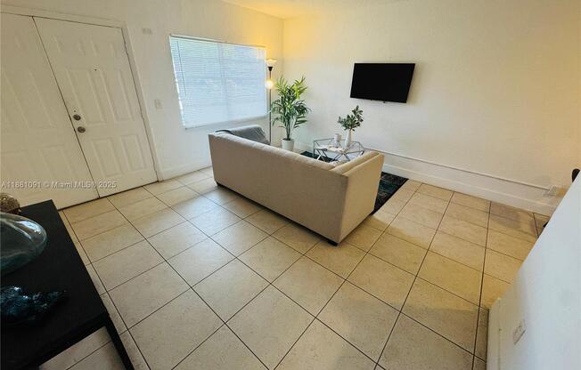 1407 NORTHWEST 103 ST