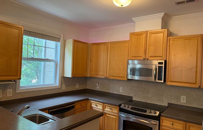 **OFFERING WAIVED APPLICATION FEES & $150 MOVE IN PROMOTION** Newly Remodeled 2BD, 2BA Raleigh Condo With a 1-Car Garage in a Quiet Community Near I-40, NC State Fairgrounds, Lenovo Center & More!