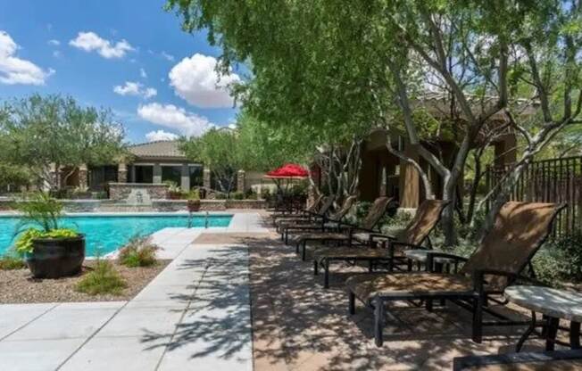 Pool with Shaded Lounge Area at Canyon Crossroads Apartment Homes in Phoenix AZ