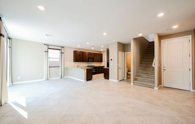 Look No Further! Lovely 3 Bedroom And 2.5 Bathroom Is Located In The Beautiful Tule Springs Master Planned Community.