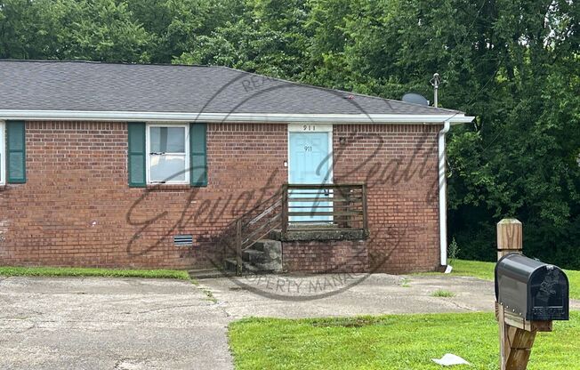 Renovated Two Bedroom Ranch Duplex in Village By the Creek!