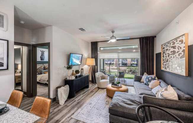 a living room with a couch and a tv