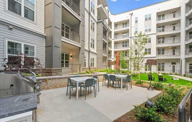 Alton Mill District Apartments in Charlotte, North Carolina Patio with Seating and BBQ Grills