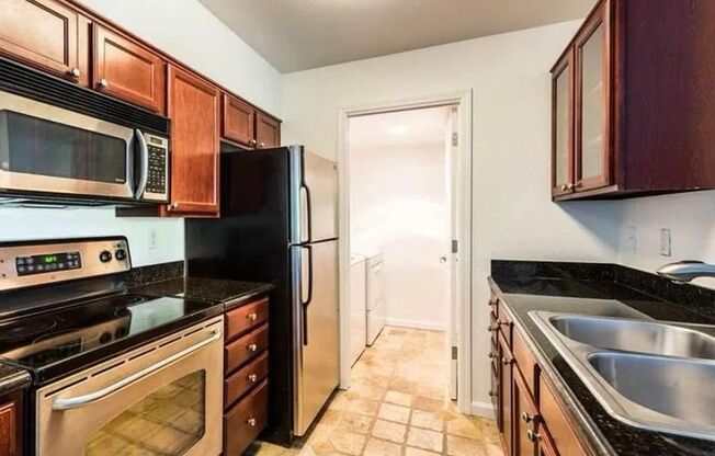 Beautiful 2-Bedroom Condo with Serene Water Views and Modern Amenities