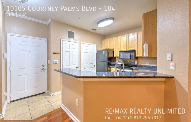 10105 COURTNEY PALMS BLVD