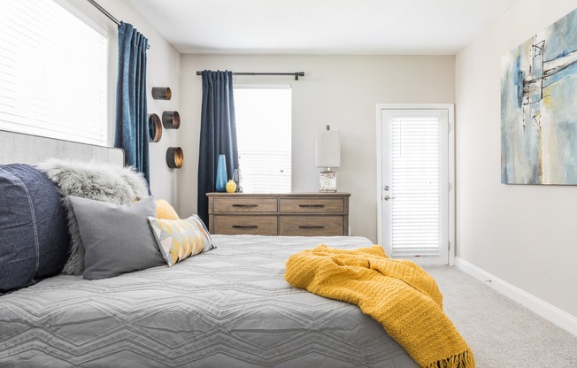 Master Bedroom with lots of natural light at The Village at Auburn apartments