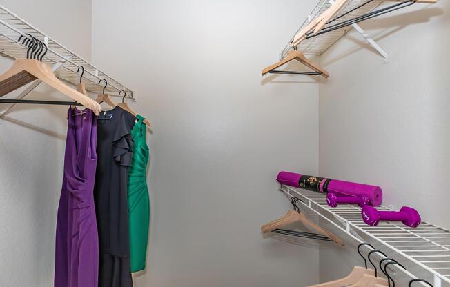 a bedroom with a purple background