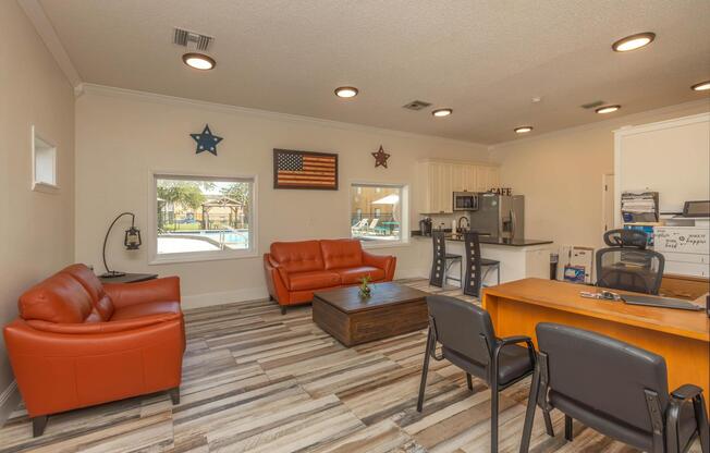 a living room filled with furniture and a table