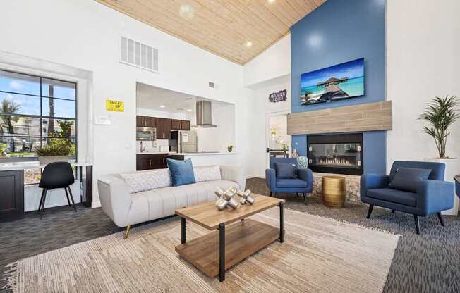Resident lounge with a fireplace and a flat screen TV mounted on the wall.