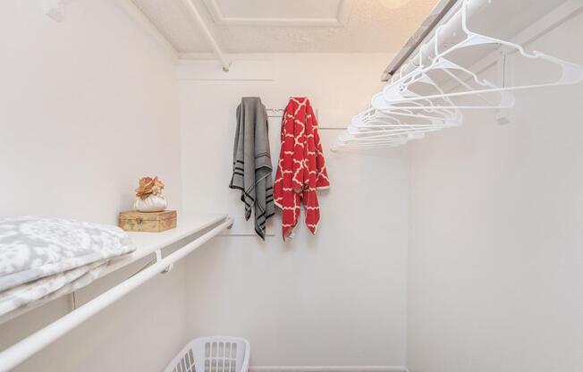 a white tub sitting next to a shower