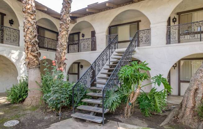 Backyard Of property With Staircase at Barcelona Apartments, Visalia