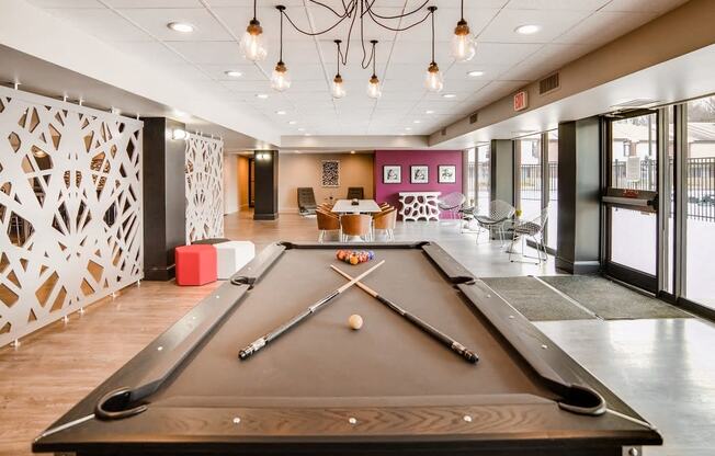 Stunning pool table in the modern resident lounge at Trillium Apartments, Fairfax, Virginia