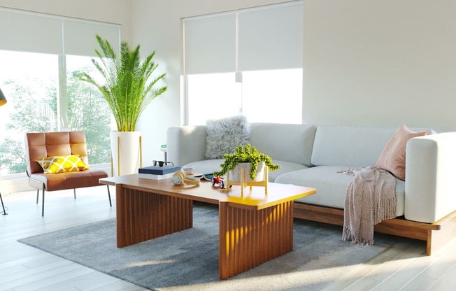 A modern living room with a white sofa, a wooden coffee table, and a red chair.
