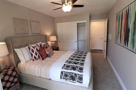 Apartments in Fremont CA for Rent-Pinebrook Apartments Bedroom with Lush Carpeting, Spacious Closet, and Modern Interiors