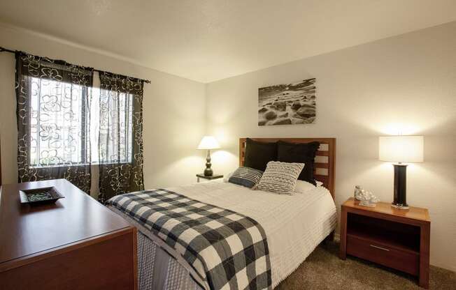 Bedroom at Whispering Sands Apartments in Albuquerque