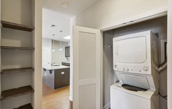 a room with a washer and dryer in it