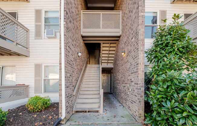 A building with a staircase leading to the second floor.