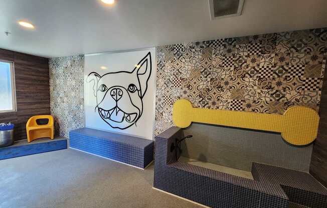 A dog drawing is on a wall with a patterned background.