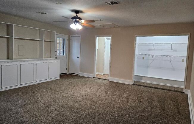 Three bedroom and two bathroom nicely remodeled with new flooring. Large wood fenced backyard