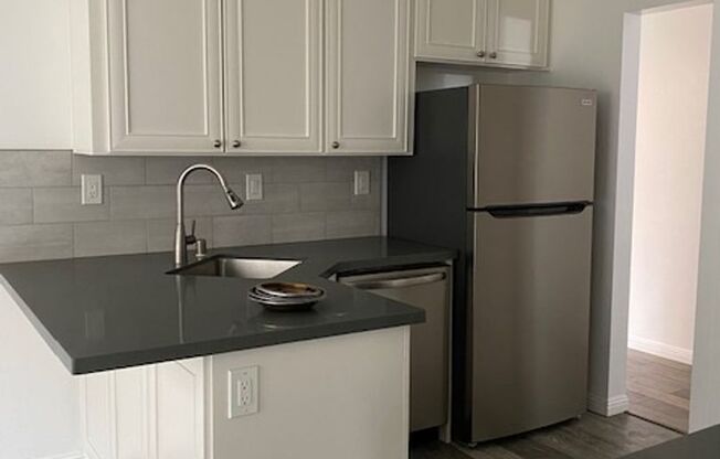 Recently remodeled spacious townhome with Refrigerator, Washer & Dryer and Garage parking