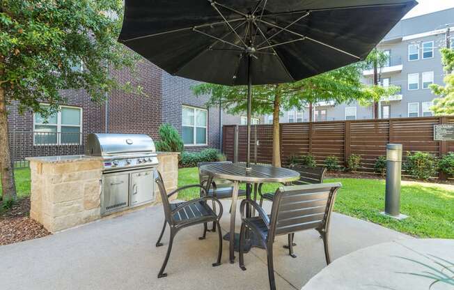 AVANT on Market Center - Outdoor grilling station with seating