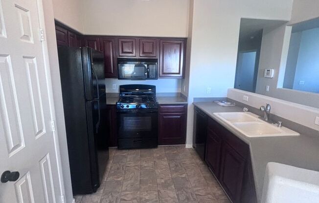 2 Bed + Den/ 2 Bath 2nd floor condo in Gated Community