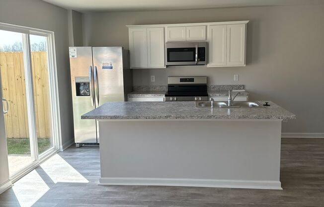 *Move In Special* BRAND NEW Three Bedroom | Two and a Half Bath Townhome in Driftwood | Lincoln Schools!