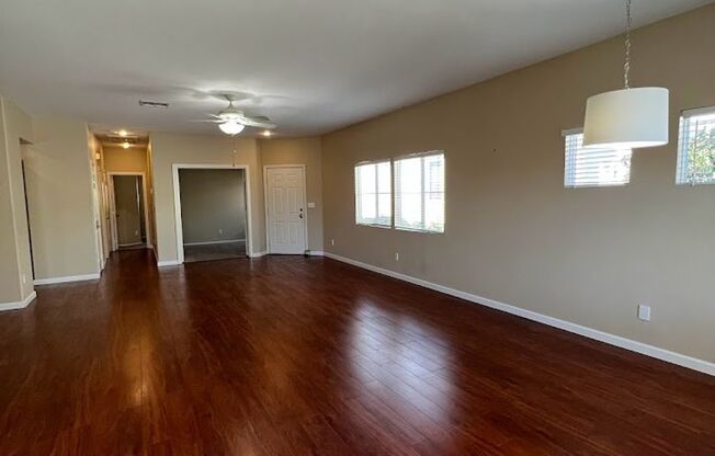 Perfect home in the heart of Summerlin with vinyl plank flooring throughout the rooms!! This charming 1-story residence offers the ideal blend of comfort, convenience, and style. Boasting 3 bedrooms and 2 bathrooms, close to Red Rock Casino and Canyon Poi