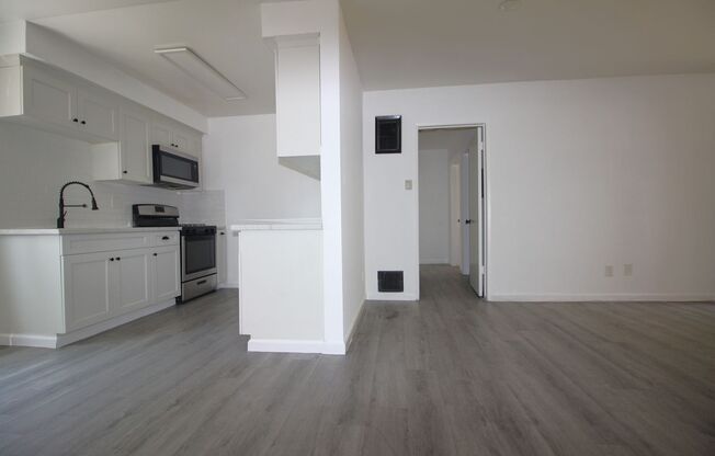7121 WOODMAN AVE.