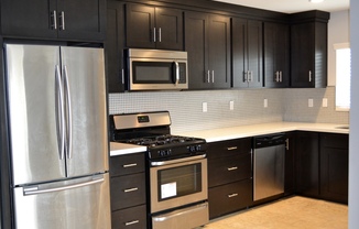 Gorgeous 2/2 with Assigned Parking! In Unit Washer & Dryer! Gated Community! Centrally Located!