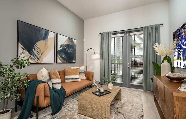 an open living room with a couch and a coffee table