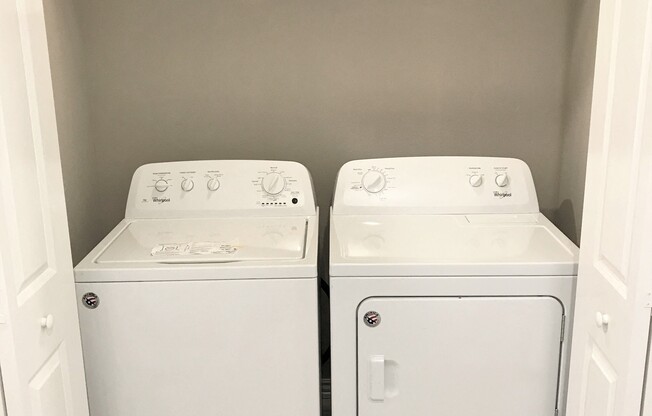 C1 (1-car) Laundry with side by side washer and dryer