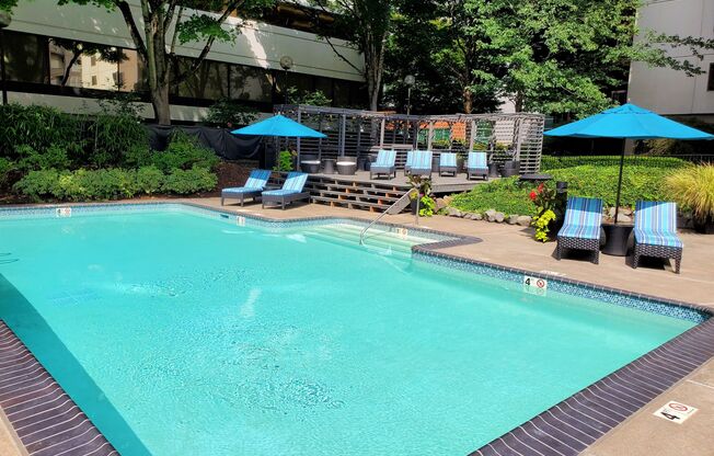 Downtown Portland Apartments-Linc 301-Pool with Lounge Seating and Umbrellas