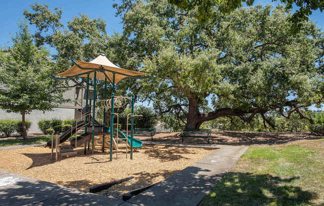 A playground with a slide at Sunset Summit, Rocklin, CA, 95765