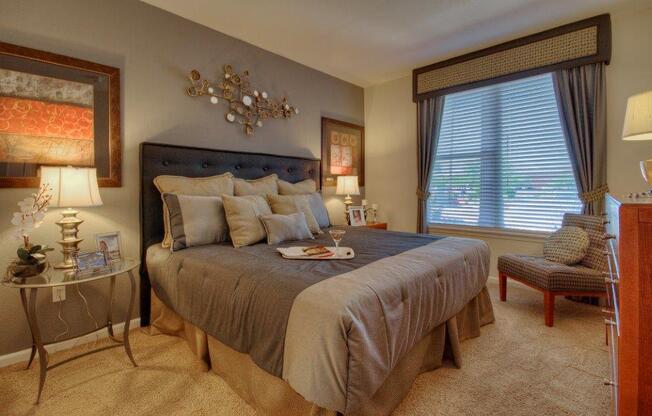 Vue Park West bedroom with king sized bed and wall to wall carpet