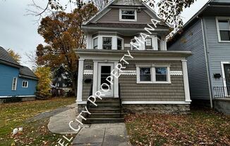 215 W UTICA ST
