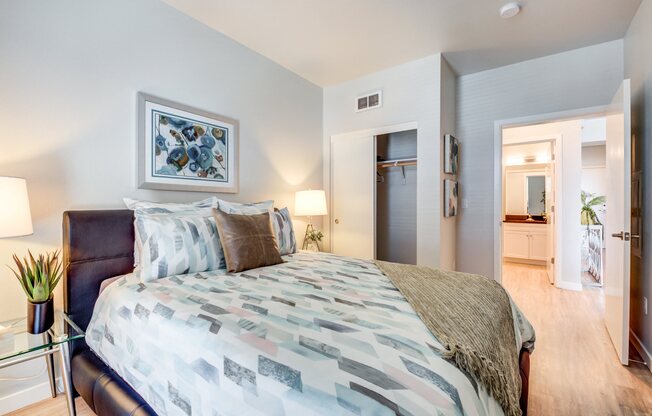 Luxury One-Bedroom Apartments in Uptown Oakland, CA - Rowhaus Apartments Bedroom with Large Window and Spacious Closet