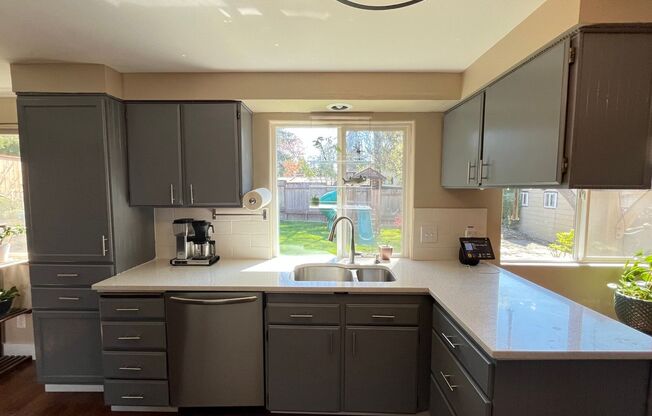 Astounding 3 bed 3 bathroom home in Beaverton! Updated kitchen& Bathrooms! Beautiful fenced Yard w/ RV Parking!