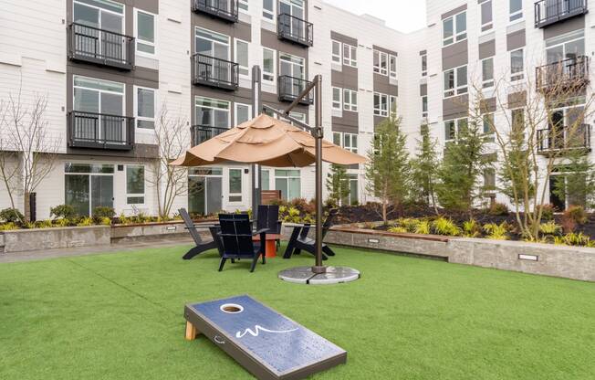 Relax in the landscaped courtyard or play a game of cornhole