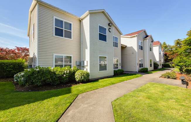 Exterior Community Building and Landscape at Landings at Morrison Apartments located in Gresham, OR.