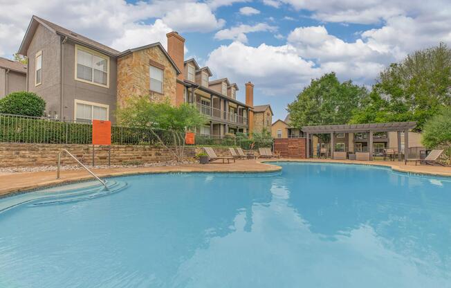 a house with a large pool of water