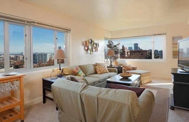 a living room with a couch and a television