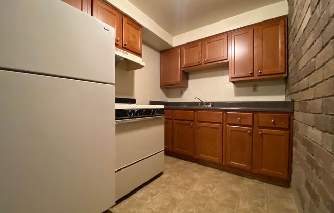 Amazing One Bedroom on the Second Floor! Built in A/C, Exposed Brick & More! Call Today!